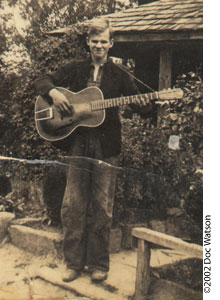 Photo of Doc Watson at age 16 with one of his first guitars.